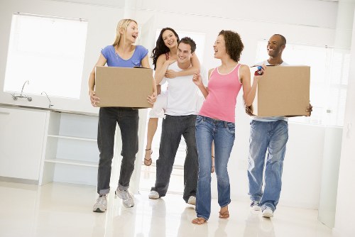 Moving house in Chiswick with packed boxes and removal van