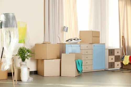Man with a van loading furniture in Chiswick for a home move