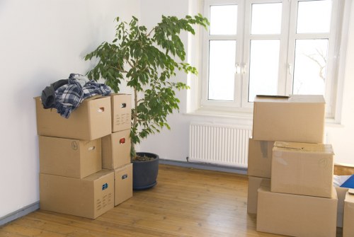 Loading household items into a moving van in Chiswick
