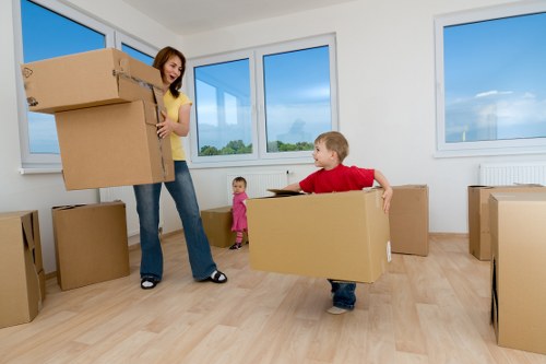 Moving team handling furniture during a home relocation in Chiswick
